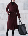 Allana - Lange en oversized jas met knopen en riem jasje