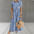 Jurken - Comfortabele jurk met klassieke look – knopen en los silhouet - Lichtblauw - S - Zarandi Amsterdam