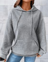 Dawn -Simpele oversized hoodie met voorzakken en reliëfpatroon