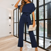 Women Trendy Outfit - Minerva | Zwarte feestelijke damesjumpsuit met gespdetail, vloeiende stof en mouwloos design voor een flatterend silhouet - Marineblauw - S - Zarandi Amsterdam