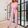 Women Trendy Outfit - Minerva | Zwarte feestelijke damesjumpsuit met gespdetail, vloeiende stof en mouwloos design voor een flatterend silhouet - Rosa - S - Zarandi Amsterdam