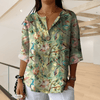 Blouses - **Noémie | Elegante bloemenblouse in zachte polyester met knoopsluiting en lange mouwen - Lichtgroen - S - Zarandi Amsterdam
