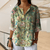 Blouses - **Noémie | Elegante bloemenblouse in zachte polyester met knoopsluiting en lange mouwen - Lichtgroen - S - Zarandi Amsterdam