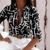 Dames Tops - Vrouwelijke blouse met print – ideaal voor lente en zomerse outfits - Zwart - S - Zarandi Amsterdam