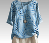 Boho Chique Natuurgeïnspireerde Blouse met Knoopdetails - ModeParisienne® Klereda – Boho Chique Natuurgeïnspireerde Blouse met Knoopdetails - Blauw - S - Zarandi Amsterdam